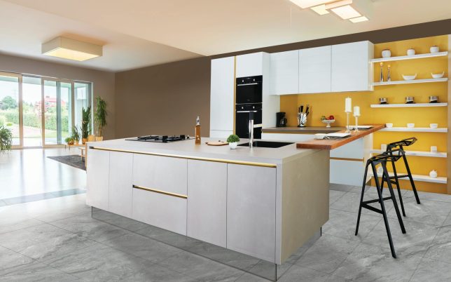Sleek and modern kitchen interior featuring a large island and open shelving in a contemporary setting.